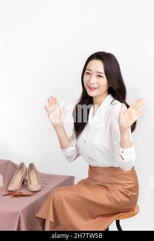 Asian Korean woman shopping host, live commerce sale show concept Stock Photo