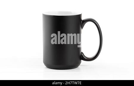 Black ceramic cup with white inside Stock Photo