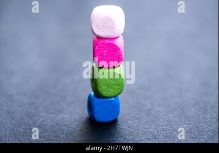 Stack of bright wooden beads Stock Photo