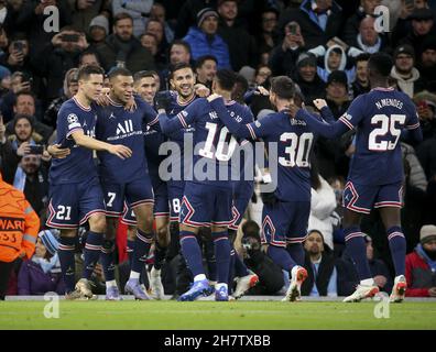 Kylian Mbappe of PSG #7 celebrates his goal with Ander Herrera, Achraf Hakimi, Leandro Paredes, Neymar Jr, Lionel Messi, Nuno Mendes of PSG during the UEFA Champions League, Group A football match between Manchester City and Paris Saint-Germain (PSG) on November 24, 2021 at Etihad Stadium in Manchester, England - Photo: Jean Catuffe/DPPI/LiveMedia Stock Photo