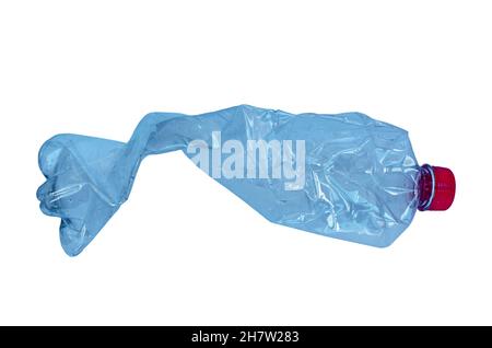 Close up of a plastic bottle isolated on white background. Recycling concept. Used plastic bottle crushed and crumpled against on the white background Stock Photo