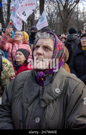 KYIV, UKRAINE - Nov. 24, 2021: Several hundred people protest against coronavirus restrictions and mandatory vaccinations. Stock Photo