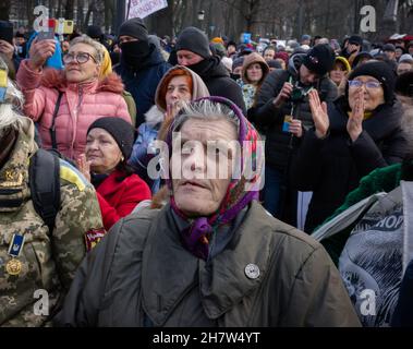 KYIV, UKRAINE - Nov. 24, 2021: Several hundred people protest against coronavirus restrictions and mandatory vaccinations. Stock Photo