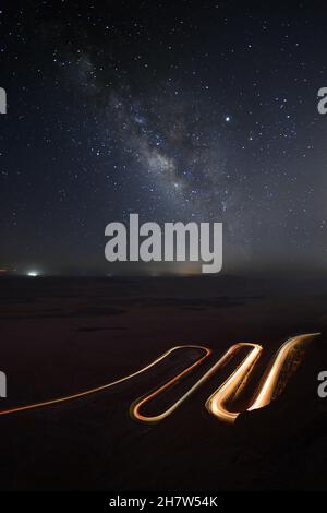 The Milky Way with car light trails on the Foreground Landscape Stock ...