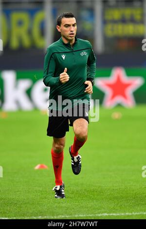 Milano, Italy. 24th Nov, 2021. Referee Ovidiu Hategan is warming up before the UEFA Champions League match between Inter and Shakhtar Donetsk at Giuseppe Meazza in Milano. (Photo Credit: Gonzales Photo/Alamy Live News Stock Photo