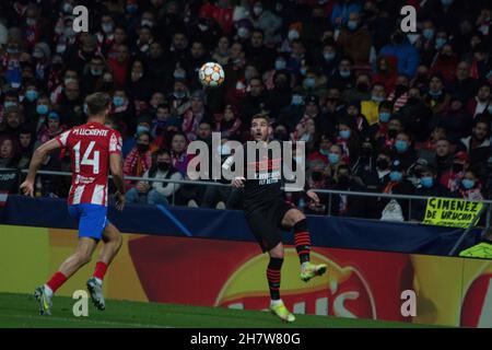 Madrid, Spain. 24th Nov, 2021. Marcos Llorente (L) and Theo Hernandez (R).during the Champions League Group B match between Atlético de Madrid and A.C. Milan. Victory of Milan by 0 to 1 with goal of Messias Junior in the minutes 87 of the game. (Photo by Jorge Gonzalez/Pacific Press) Credit: Pacific Press Media Production Corp./Alamy Live News Stock Photo