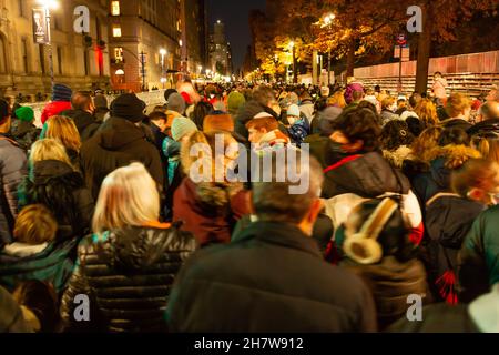 New York, NY - 24 November 2021. Crowds throng to the Macy’s Thanksgiving Parade balloon inflation site, which opened for public viewing the afternoon Stock Photo