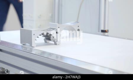 Manufacturing parts for engine. Media. Details production line. High-tech precision parts forming line. Stock Photo