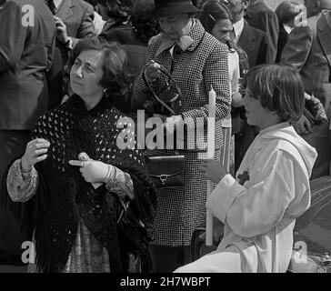 Children and relatives come out after a religious ceremony, possibly confirmation, Paris, France, 1978 Stock Photo