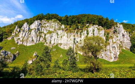 Crown rocks - Skaly Koronne - Jurassic limestone mountain massif with Glove Rock - Rekawica - in Pradnik creek valley of Cracow-Czestochowa upland in Stock Photo