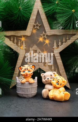 Cubs 2022 Christmas Ornament Handmade Souvenir Soap Tiger Cub In Barrel Symbol Of 2022 Against  Background Of The Branches Of The Christmas Tree Stock Photo - Alamy