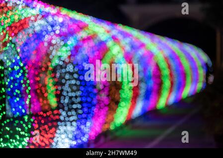Colorful bokeh glitter defocused lights abstract background. Stock Photo