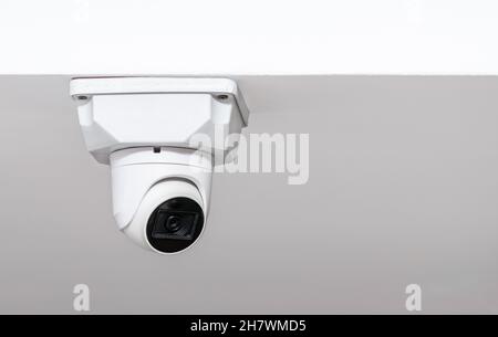 White ceiling mounted security camera with night vision Stock Photo