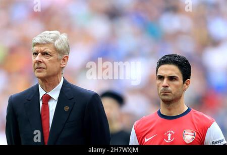 File photo dated 17-05-2014 of Arsenal manager Arsene Wenger and Mikel Arteta prior to kick-off. Mikel Arteta is hopeful of bringing former Arsenal boss Arsene Wenger back to the Emirates Stadium in some capacity after revealing initial talks have taken place. Issue date: Thursday November 25, 2021. Stock Photo