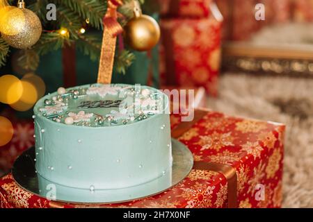 A Christmas tree cake with the baking … – License Images