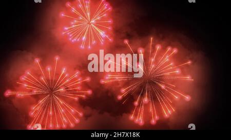 Festive bright fireworks in the night sky. Shining lights and celebration show Stock Photo