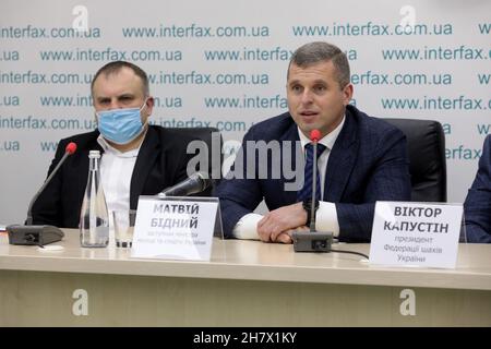 KYIV, UKRAINE - NOVEMBER 25, 2021 - Ukraine's head coach Oleksandr Sulypa (L) and Deputy Minister of Youth and Sports of Ukraine Matvii Bidnyi attend Stock Photo