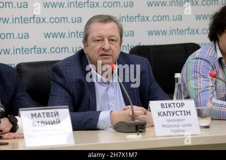 KYIV, UKRAINE - NOVEMBER 25, 2021 - President of the Ukrainian Chess Federation Viktor Kapustin is pictured during a press conference after Ukraine wo Stock Photo