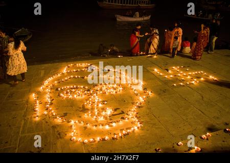 Ghats of Varanasi decorated and light up with small earthen lamps during Dev Diwali Festival at the ghats of Ganges in Varanasi. Stock Photo