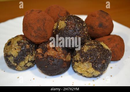 Delicious Chocolate Truffels with Candied Ginger. Close-up View on White. Healthy Cooking. Stock Photo
