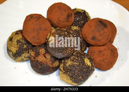 Delicious Chocolate Truffels with Candied Ginger. Close-up View on White. Healthy Cooking. Stock Photo