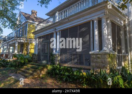 NEW ORLEANS, LA, USA - DECEMBER 29, 2020: Shaded front of rustic house in Uptown neighborhood Stock Photo
