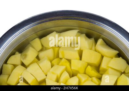 Cut peeled raw potato in the water. Top view Stock Photo