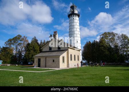 Door County, Wisconsin - October 22, 2021: Tourists visit and enjoy the grounds of the Cana Park Lighthouse Stock Photo
