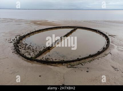 An aerial view of the famous Victorian swimming pool which fills at high tide located on the beach at Powfoot, Dumfries and Galloway, Scotland. Stock Photo