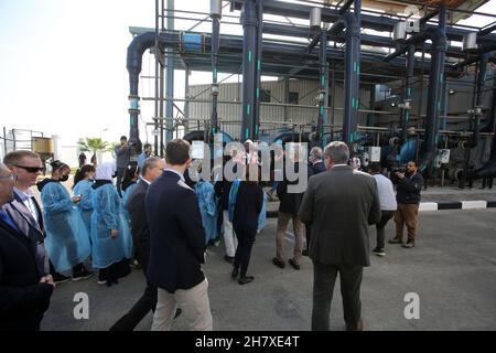 Members of a EU delegation visit a desalination plant funded by the EU, in Deir al-Balah, in the central Gaza Strip, on November 24, 2021. Stock Photo