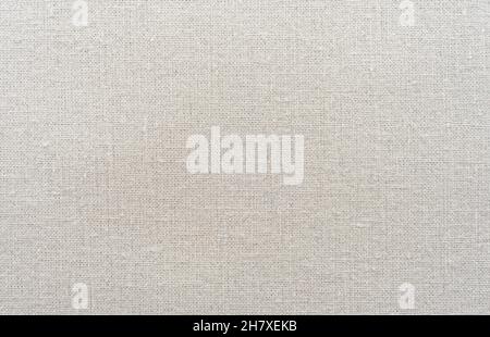 Background from chintz, light gray calico. Sewing material. White canvas texture background with delicate striped seamless pattern. Cloth Stock Photo