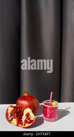 Cocktail with pomegranate and ice. Stock Photo