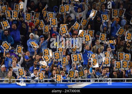 Detroit Lions hold up signs on a third down play against the