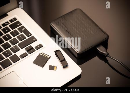 Multiple storage devices, data security, digital data storage Stock Photo