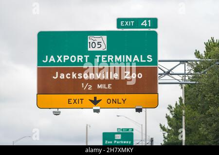 Jacksonville, USA interstate highway i295 road in Florida and sign directions for Jaxport port authority terminals and zoo exit only lane on us 105 st