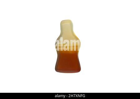 Cola flavored gummy jellie in the shape of cola bottle,isolated on white background. - Image Stock Photo