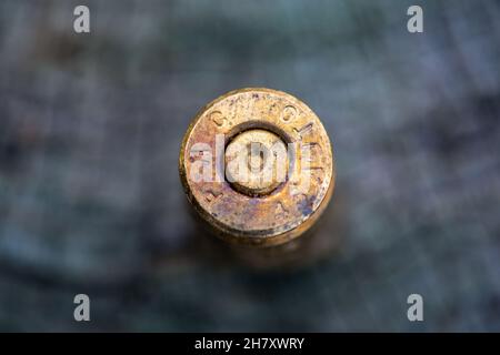 bullet casing abandoned on the ground Stock Photo