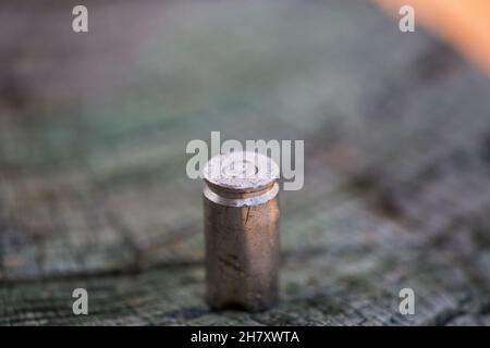 bullet casing abandoned on the ground Stock Photo