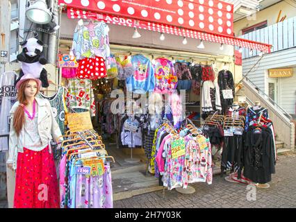 Takeshita Street or Takeshita-dori, a bustling street in the Harajuku part of Tokyo in Japan selling vibrant and extreme fashion, food, and more. Stock Photo