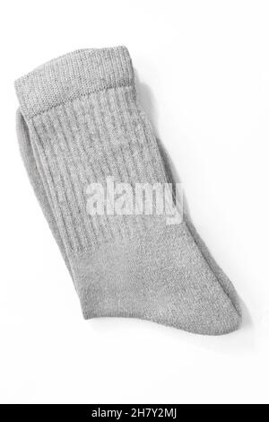 white soft cotton pair of folded socks on a desk Stock Photo - Alamy