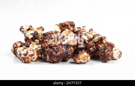 Group of chocolate popcorns isolated on white background. Delicious dessert Stock Photo