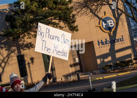 St. Paul, Minnesota. November 20, 2021. Medical freedom rally. Woman holding sign outside Hubbard broadcasting to tell them to cover their protests an Stock Photo