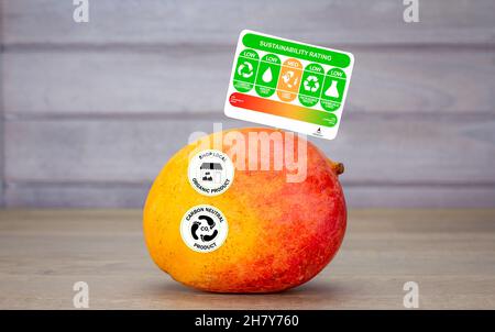 consumer food sustainability label on mango with product rating for sustainable food ethical concept Stock Photo
