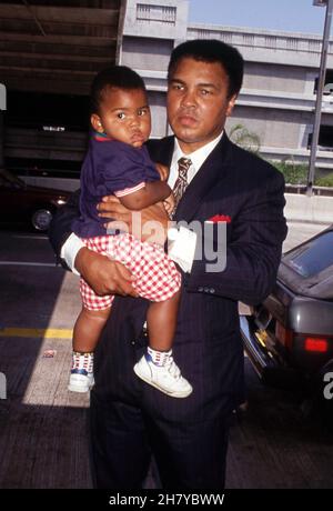 Muhammad Ali and son Asaad Amin Circa 1986. Credit: Ralph Dominguez/MediaPunch Stock Photo