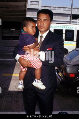 Muhammad Ali and son Asaad Amin Circa 1986. Credit: Ralph Dominguez/MediaPunch Stock Photo