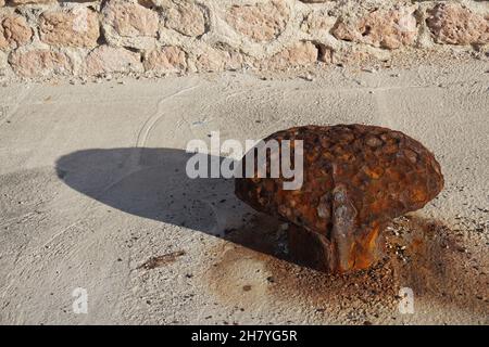 old metal rusty anchor for boat on land mediterranee france Stock Photo