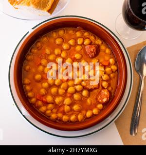 Garbanzos a la riojana, a spanish chickpeas stew with ham Stock Photo