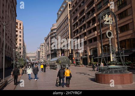Jerewan, Armenia. 14th Nov, 2021. Passers-by, some wearing mouth-nose protection, are walking along Northern Avenue (shopping street) downtown Credit: Christian Charisius/dpa/Alamy Live News Stock Photo