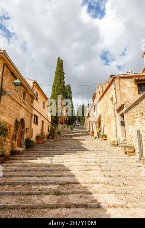 Pollenca on Mallorca stairs stairway to church El Calvari holidays vacation aerial photo view portrait format in Spain Stock Photo