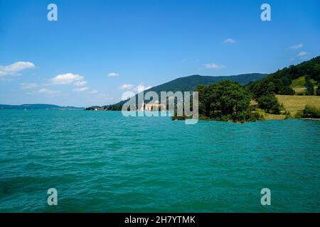 Landscape shots of the Bavarian Tegernsee lake and its shores with mountains in the background Stock Photo